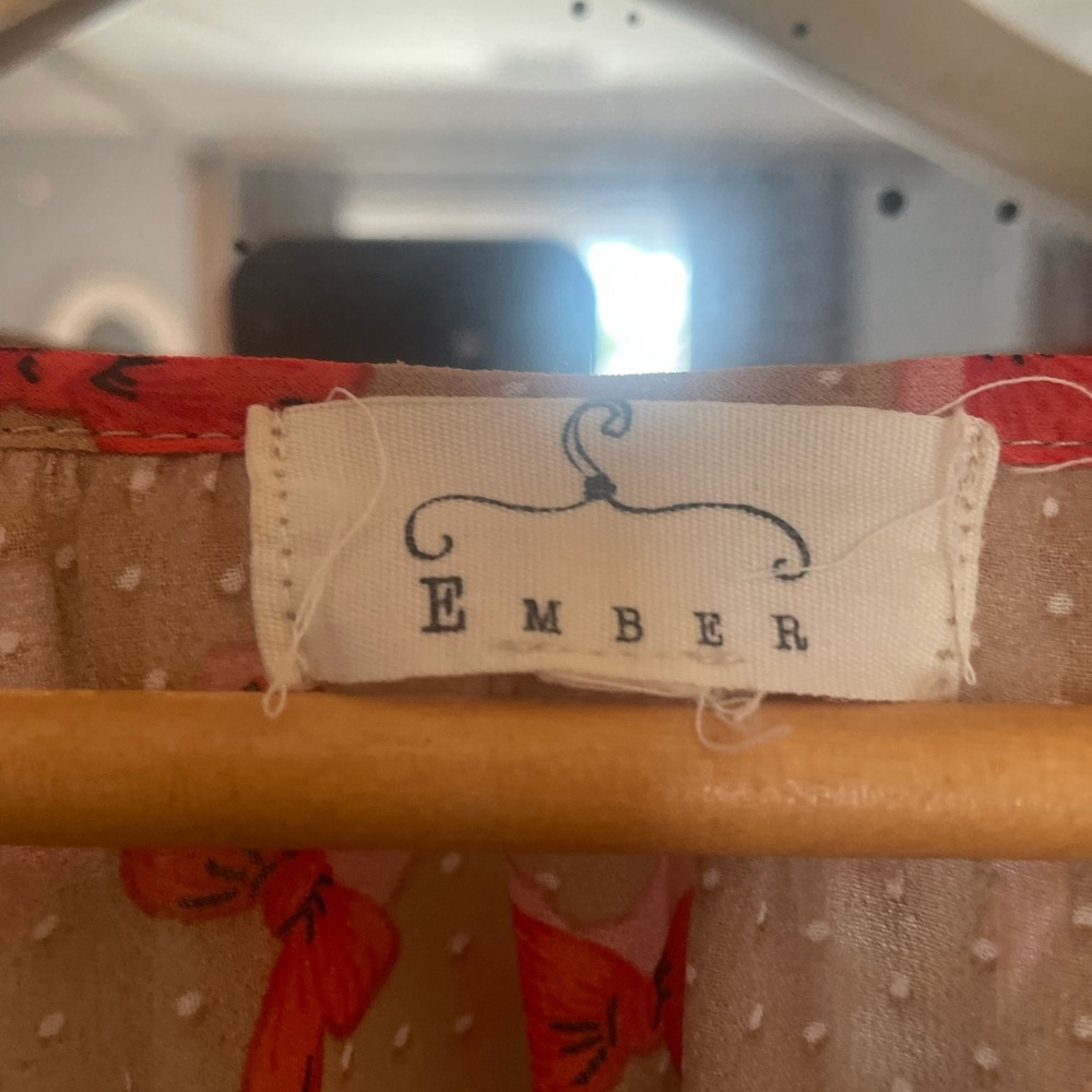 Rayon, light tan with orange/red bows